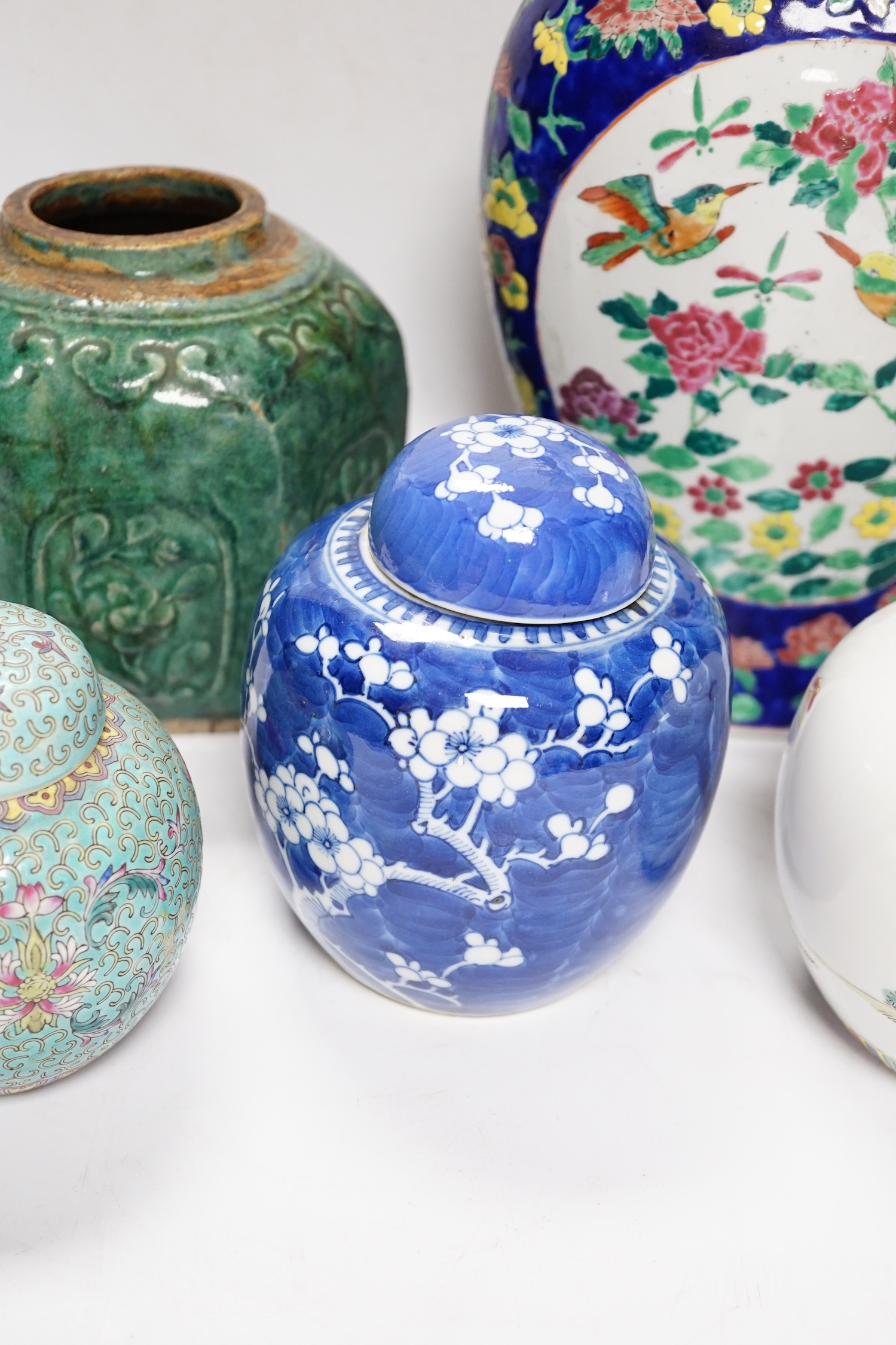 A Chinese famille rose vase and cover and four Chinese jars, 19th/20th century, vase and cover, 40cm high